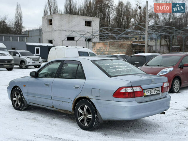 Синий Мазда 626, объемом двигателя 1.99 л и пробегом 360 тыс. км за 1500 $, фото 12 на Automoto.ua