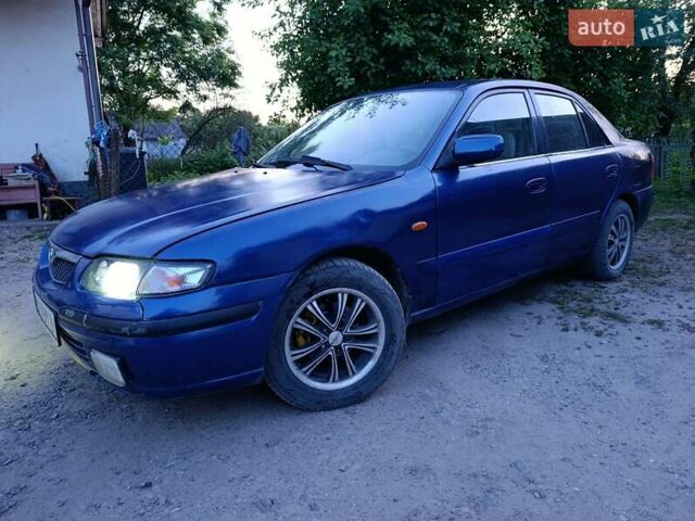 Синий Мазда 626, объемом двигателя 1.84 л и пробегом 311 тыс. км за 1850 $, фото 1 на Automoto.ua