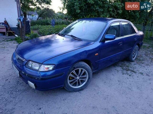 Синий Мазда 626, объемом двигателя 1.84 л и пробегом 311 тыс. км за 1850 $, фото 4 на Automoto.ua