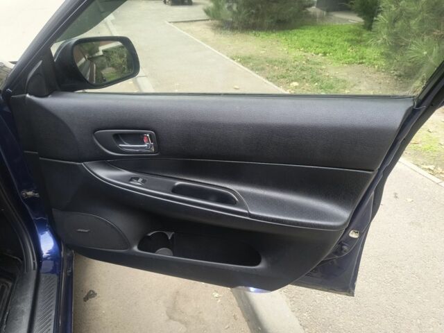 Синий Мазда 626, объемом двигателя 2 л и пробегом 289 тыс. км за 2450 $, фото 5 на Automoto.ua