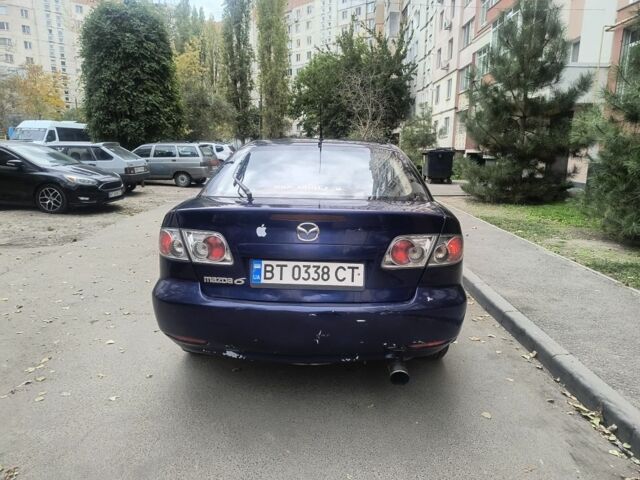 Синий Мазда 626, объемом двигателя 2 л и пробегом 289 тыс. км за 2450 $, фото 9 на Automoto.ua