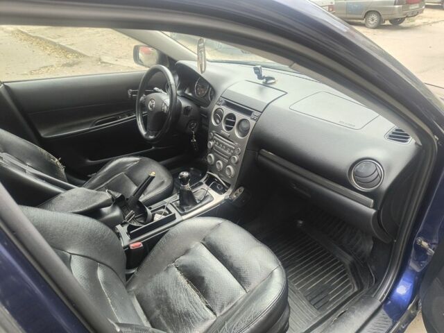 Синий Мазда 626, объемом двигателя 2 л и пробегом 289 тыс. км за 2450 $, фото 4 на Automoto.ua