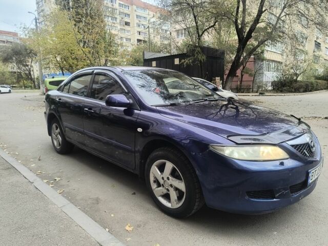 Синий Мазда 626, объемом двигателя 2 л и пробегом 289 тыс. км за 2450 $, фото 8 на Automoto.ua