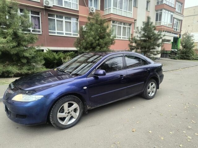 Синий Мазда 626, объемом двигателя 2 л и пробегом 289 тыс. км за 2450 $, фото 12 на Automoto.ua