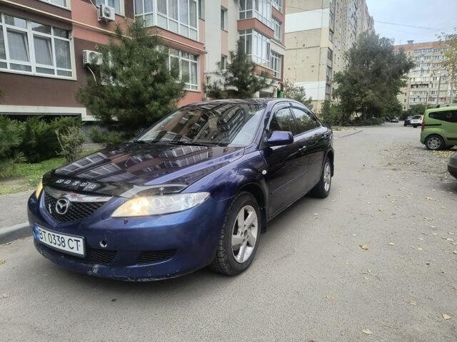 Синий Мазда 626, объемом двигателя 2 л и пробегом 289 тыс. км за 2450 $, фото 3 на Automoto.ua