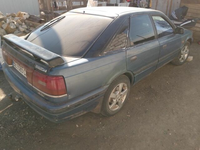 Синий Мазда 626, объемом двигателя 2 л и пробегом 800 тыс. км за 1100 $, фото 1 на Automoto.ua