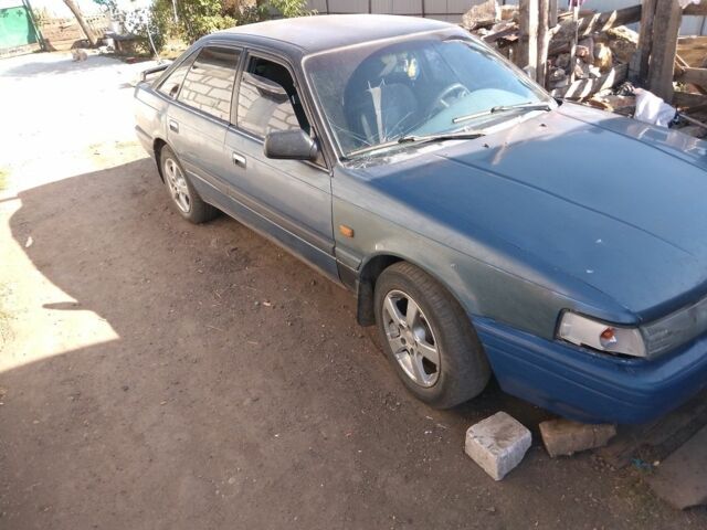 Синий Мазда 626, объемом двигателя 2 л и пробегом 800 тыс. км за 1100 $, фото 2 на Automoto.ua