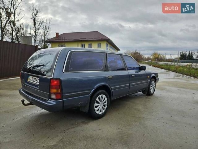 Синий Мазда 626, объемом двигателя 2 л и пробегом 502 тыс. км за 1100 $, фото 1 на Automoto.ua