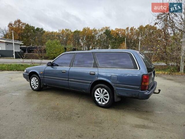 Синий Мазда 626, объемом двигателя 2 л и пробегом 502 тыс. км за 1100 $, фото 2 на Automoto.ua