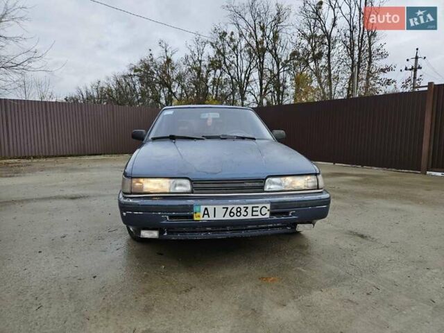 Синий Мазда 626, объемом двигателя 2 л и пробегом 502 тыс. км за 1100 $, фото 4 на Automoto.ua