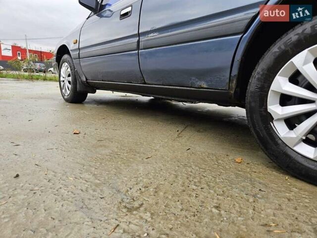 Синий Мазда 626, объемом двигателя 2 л и пробегом 502 тыс. км за 1100 $, фото 19 на Automoto.ua