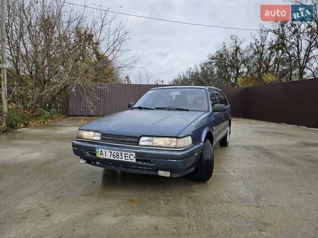 Синий Мазда 626, объемом двигателя 2 л и пробегом 502 тыс. км за 1100 $, фото 6 на Automoto.ua