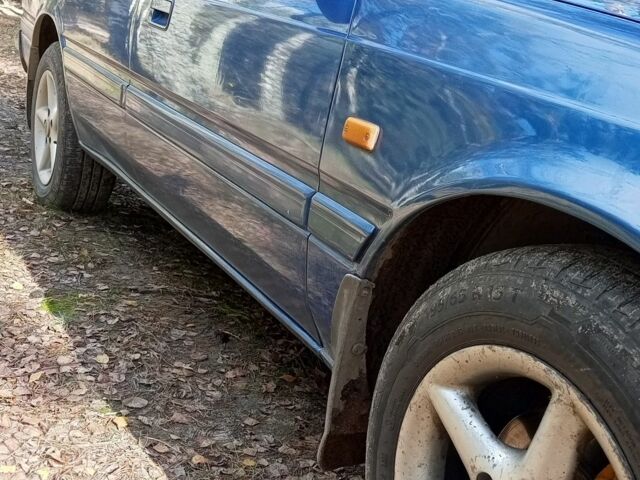 Синий Мазда 626, объемом двигателя 2 л и пробегом 400 тыс. км за 1968 $, фото 7 на Automoto.ua