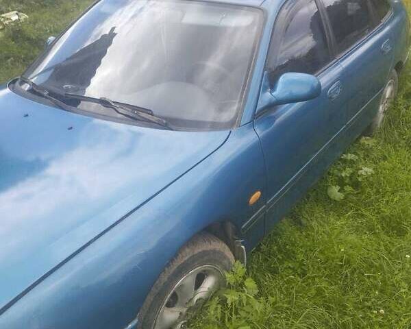 Синій Мазда 626, об'ємом двигуна 2.5 л та пробігом 200 тис. км за 1000 $, фото 3 на Automoto.ua