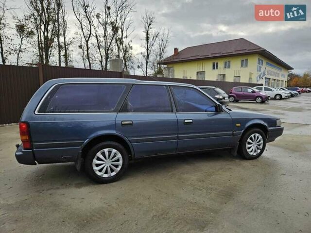 Синий Мазда 626, объемом двигателя 2 л и пробегом 502 тыс. км за 1100 $, фото 8 на Automoto.ua