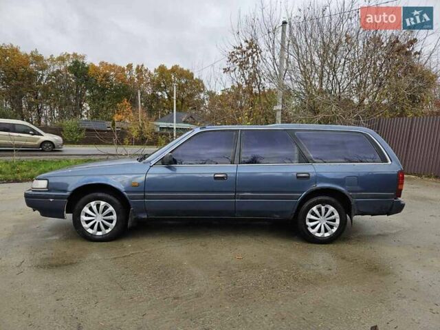 Синий Мазда 626, объемом двигателя 2 л и пробегом 502 тыс. км за 1100 $, фото 9 на Automoto.ua