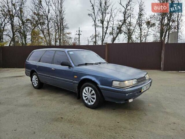 Синий Мазда 626, объемом двигателя 2 л и пробегом 502 тыс. км за 1100 $, фото 10 на Automoto.ua