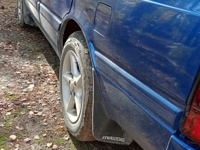Синий Мазда 626, объемом двигателя 2 л и пробегом 400 тыс. км за 1968 $, фото 3 на Automoto.ua