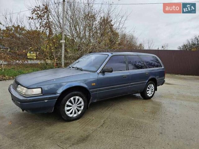 Синий Мазда 626, объемом двигателя 2 л и пробегом 502 тыс. км за 1100 $, фото 5 на Automoto.ua