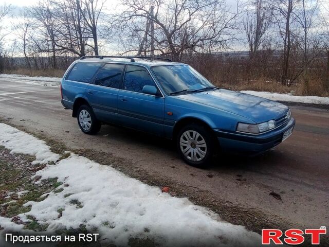 Синій Мазда 626, об'ємом двигуна 2.2 л та пробігом 500 тис. км за 2000 $, фото 2 на Automoto.ua