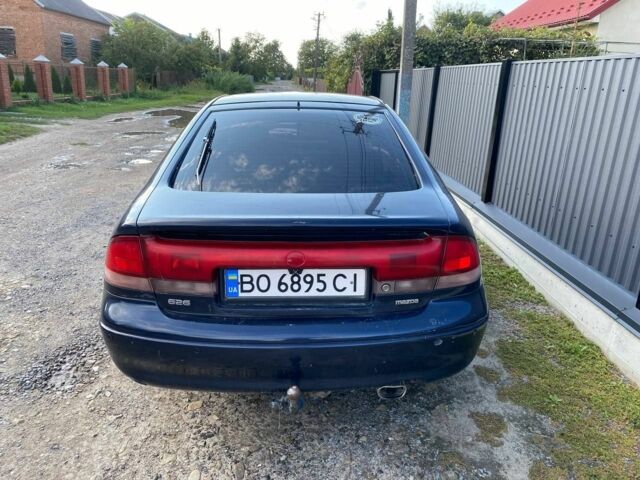 Синий Мазда 626, объемом двигателя 1.8 л и пробегом 287 тыс. км за 1300 $, фото 8 на Automoto.ua