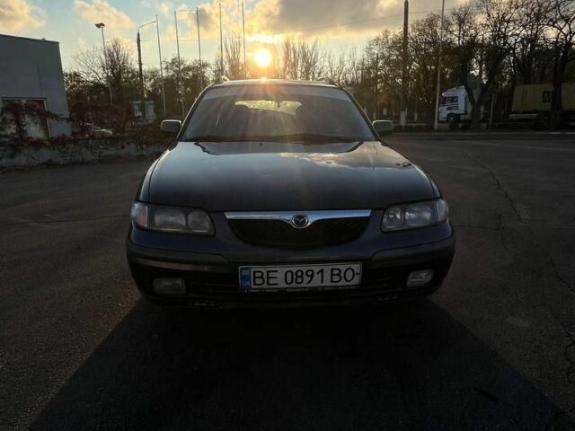 Синій Мазда 626, об'ємом двигуна 1.8 л та пробігом 320 тис. км за 3200 $, фото 2 на Automoto.ua