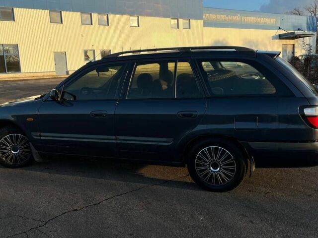 Синій Мазда 626, об'ємом двигуна 1.8 л та пробігом 320 тис. км за 3200 $, фото 13 на Automoto.ua