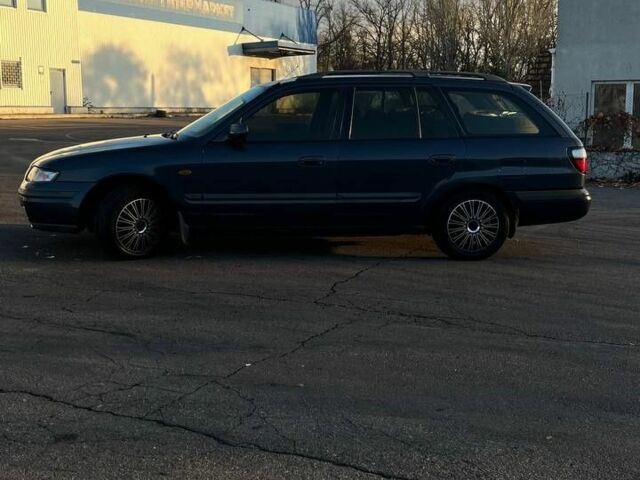 Синій Мазда 626, об'ємом двигуна 1.8 л та пробігом 320 тис. км за 3200 $, фото 1 на Automoto.ua