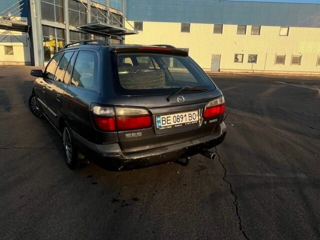 Синій Мазда 626, об'ємом двигуна 1.8 л та пробігом 320 тис. км за 3200 $, фото 11 на Automoto.ua