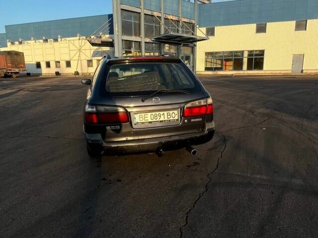 Синій Мазда 626, об'ємом двигуна 1.8 л та пробігом 320 тис. км за 3200 $, фото 5 на Automoto.ua