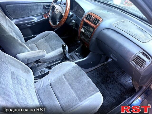 Синій Мазда 626, об'ємом двигуна 2 л та пробігом 200 тис. км за 2250 $, фото 10 на Automoto.ua