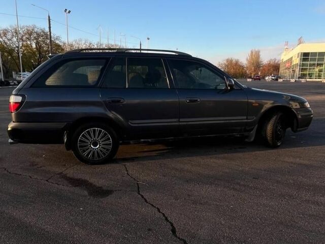 Синій Мазда 626, об'ємом двигуна 1.8 л та пробігом 320 тис. км за 3200 $, фото 3 на Automoto.ua