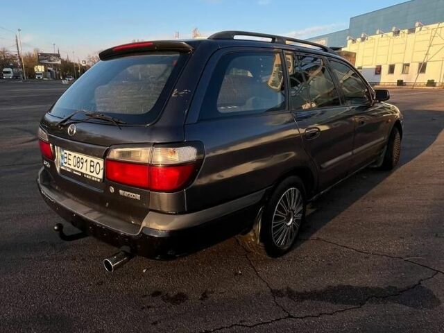 Синій Мазда 626, об'ємом двигуна 1.8 л та пробігом 320 тис. км за 3200 $, фото 14 на Automoto.ua