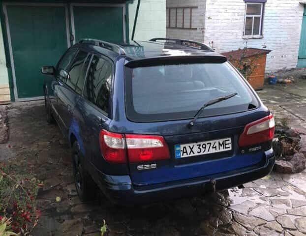 Синій Мазда 626, об'ємом двигуна 2 л та пробігом 5 тис. км за 1074 $, фото 3 на Automoto.ua