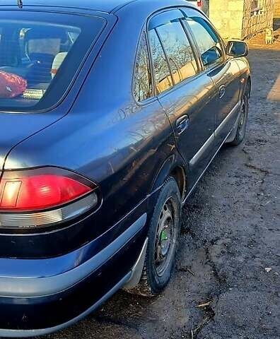 Синий Мазда 626, объемом двигателя 2 л и пробегом 400 тыс. км за 3000 $, фото 1 на Automoto.ua