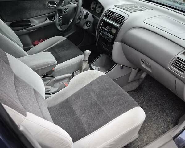 Синій Мазда 626, об'ємом двигуна 2 л та пробігом 245 тис. км за 2500 $, фото 14 на Automoto.ua