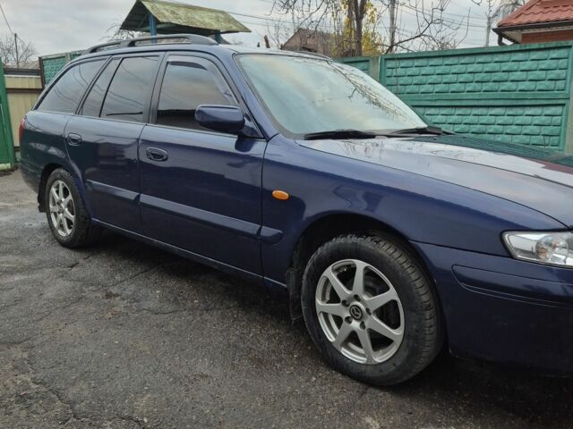 Синий Мазда 626, объемом двигателя 2 л и пробегом 245 тыс. км за 2500 $, фото 1 на Automoto.ua