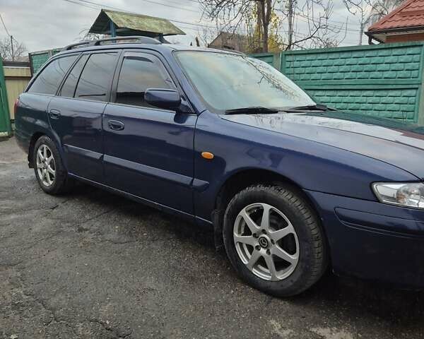 Синій Мазда 626, об'ємом двигуна 2 л та пробігом 245 тис. км за 2500 $, фото 4 на Automoto.ua