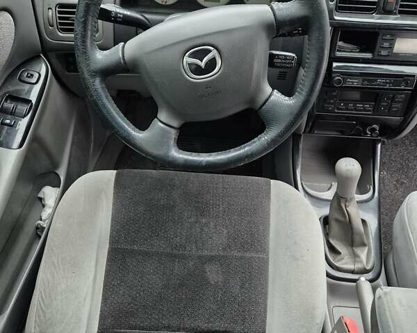 Синій Мазда 626, об'ємом двигуна 2 л та пробігом 245 тис. км за 2500 $, фото 16 на Automoto.ua