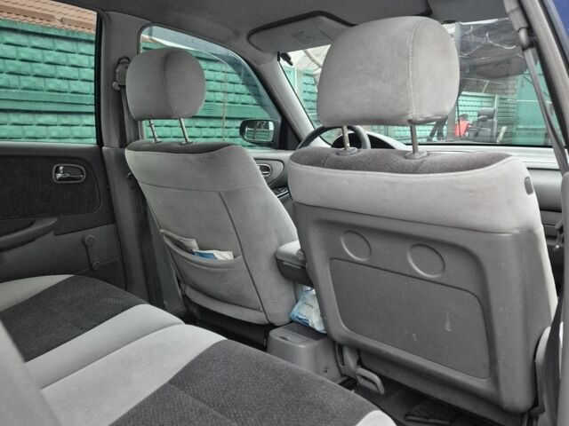 Синий Мазда 626, объемом двигателя 2 л и пробегом 245 тыс. км за 2500 $, фото 6 на Automoto.ua