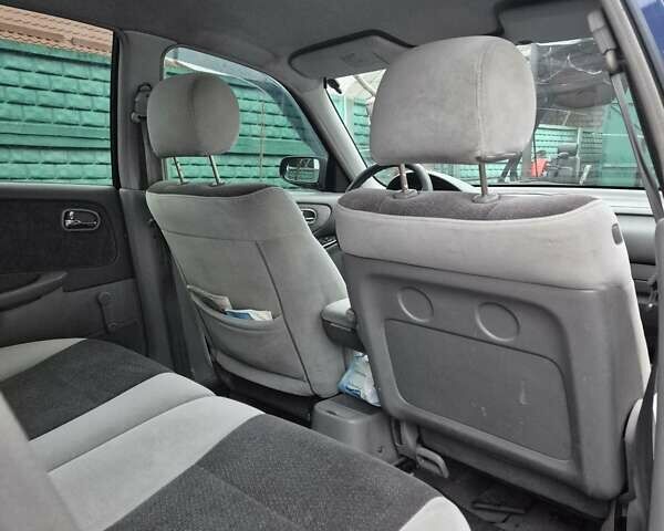 Синій Мазда 626, об'ємом двигуна 2 л та пробігом 245 тис. км за 2500 $, фото 10 на Automoto.ua