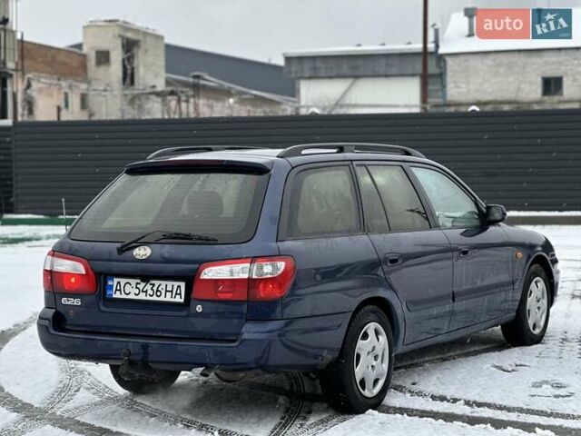 Синій Мазда 626, об'ємом двигуна 2 л та пробігом 294 тис. км за 1999 $, фото 3 на Automoto.ua