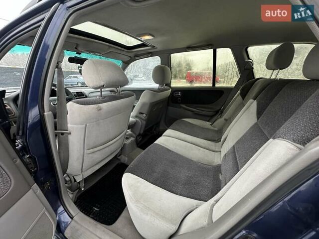 Синій Мазда 626, об'ємом двигуна 2 л та пробігом 294 тис. км за 1999 $, фото 9 на Automoto.ua