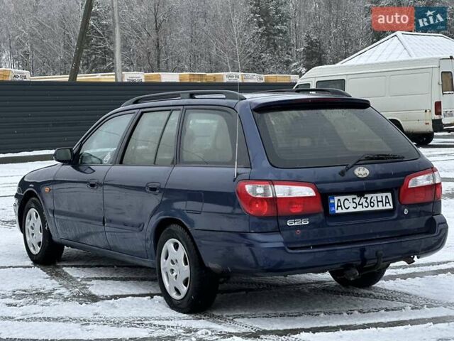 Синій Мазда 626, об'ємом двигуна 2 л та пробігом 294 тис. км за 1999 $, фото 5 на Automoto.ua