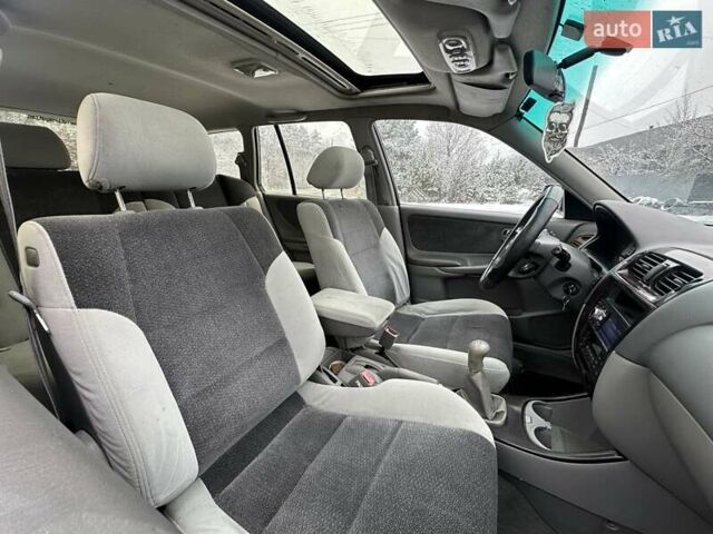 Синій Мазда 626, об'ємом двигуна 2 л та пробігом 294 тис. км за 1999 $, фото 7 на Automoto.ua