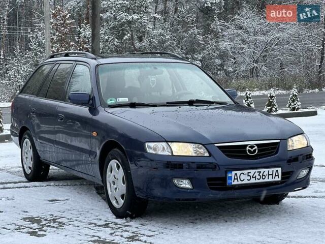 Синій Мазда 626, об'ємом двигуна 2 л та пробігом 294 тис. км за 1999 $, фото 2 на Automoto.ua