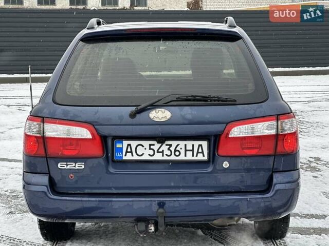 Синій Мазда 626, об'ємом двигуна 2 л та пробігом 294 тис. км за 1999 $, фото 4 на Automoto.ua