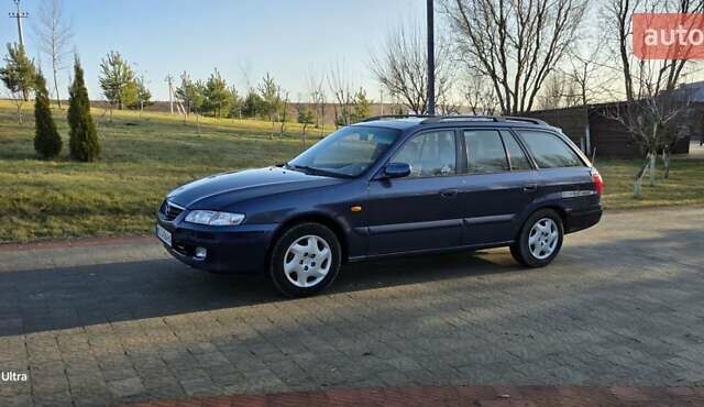 Синий Мазда 626, объемом двигателя 2 л и пробегом 290 тыс. км за 2900 $, фото 14 на Automoto.ua