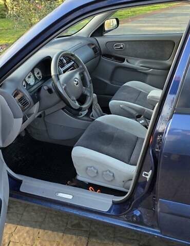 Синий Мазда 626, объемом двигателя 2 л и пробегом 290 тыс. км за 2900 $, фото 3 на Automoto.ua