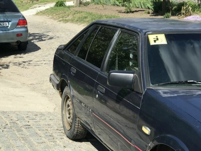 Синій Мазда 626, об'ємом двигуна 2 л та пробігом 350 тис. км за 1290 $, фото 6 на Automoto.ua